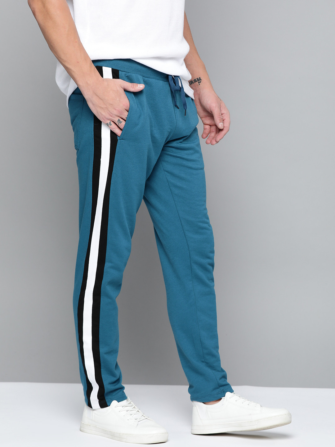 

Mast & Harbour Men Blue Solid Track Pants