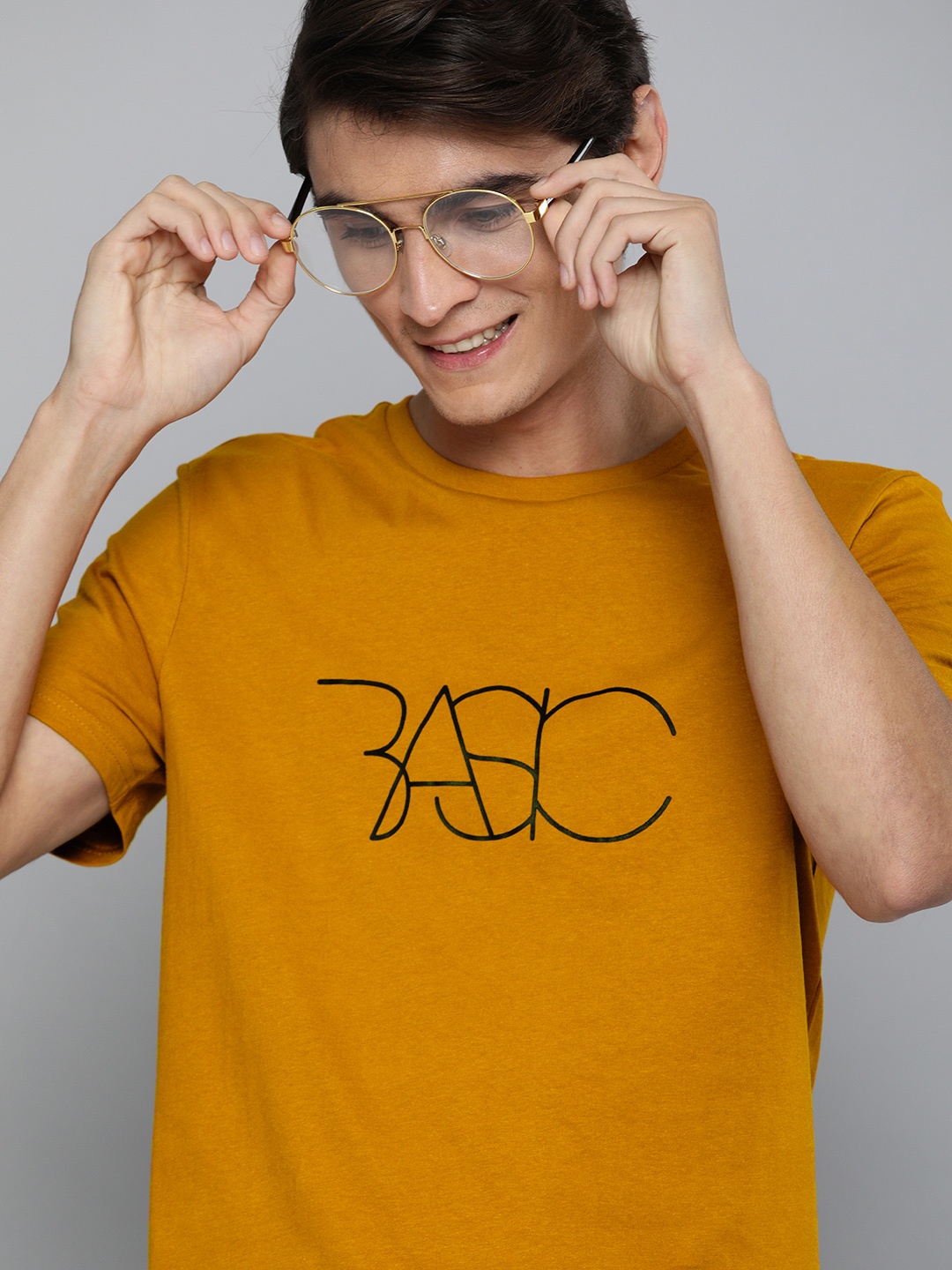 

Mast Harbour Men Mustard Yellow Printed Round Neck Pure Cotton T-shirt