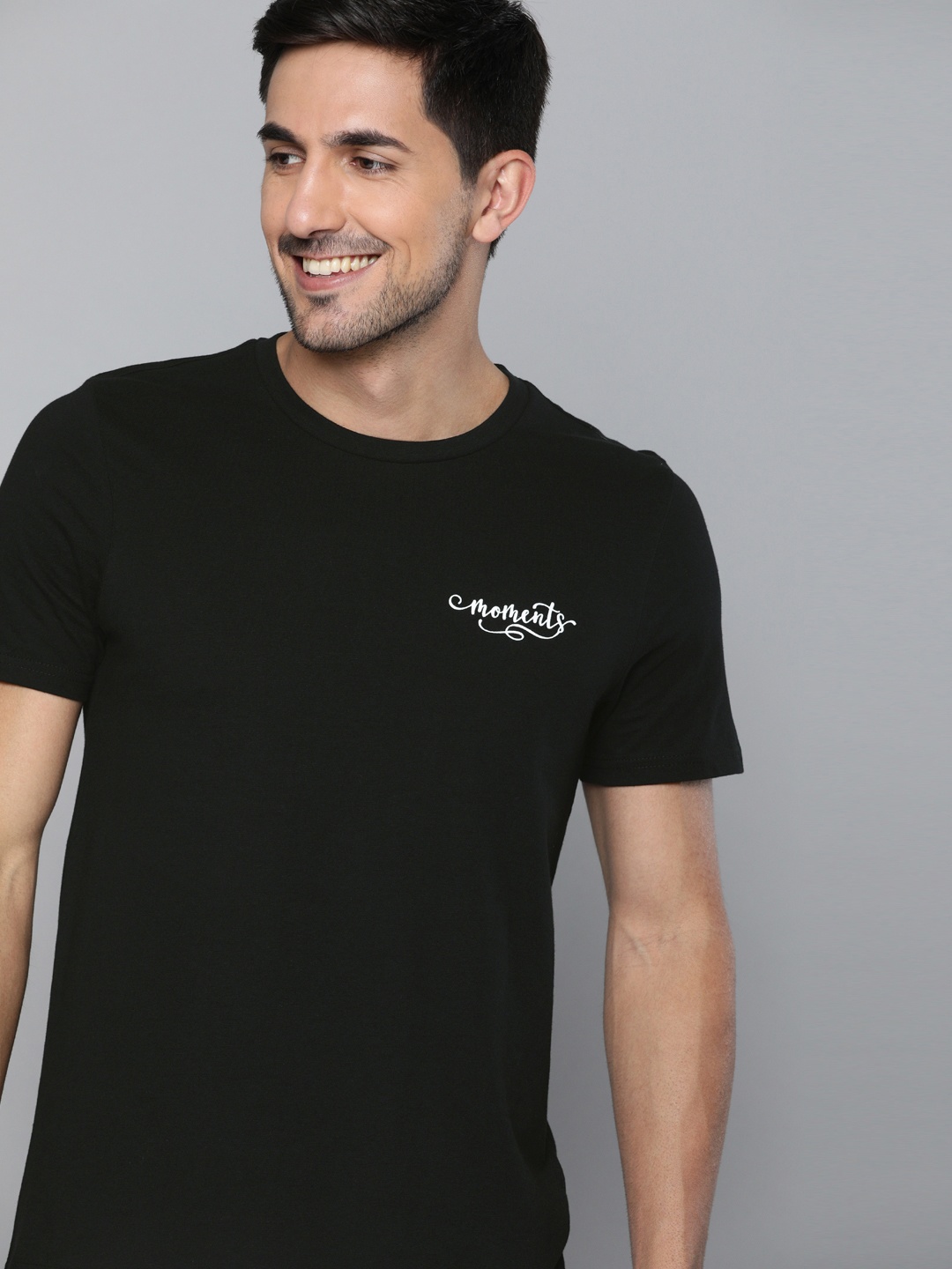 

Mast & Harbour Men Black Solid Round Neck T-shirt With Printed Detailing