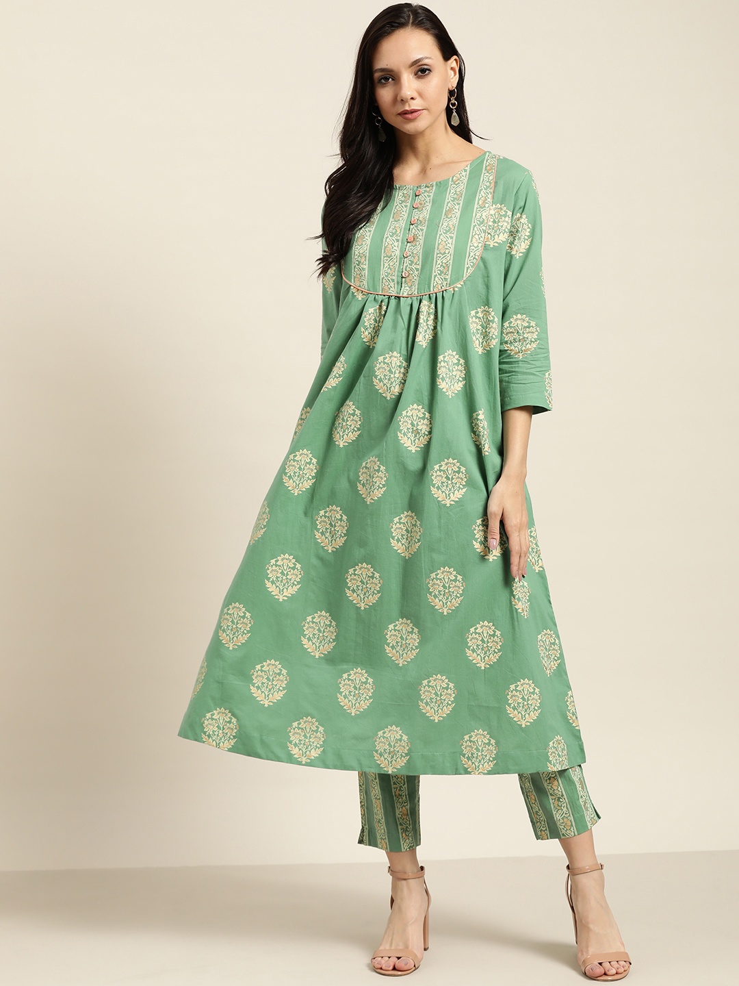 

Sangria Women Green & Golden Printed Kurta with Trousers