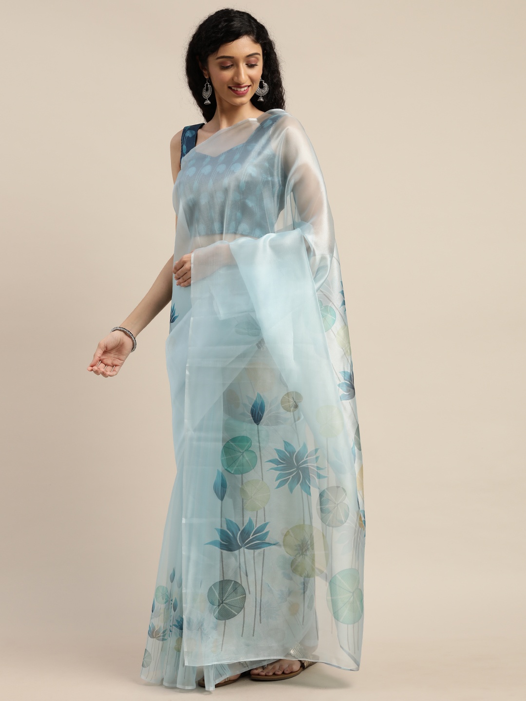 

Rajnandini Blue Floral Printed Semi Sheer Organza Saree