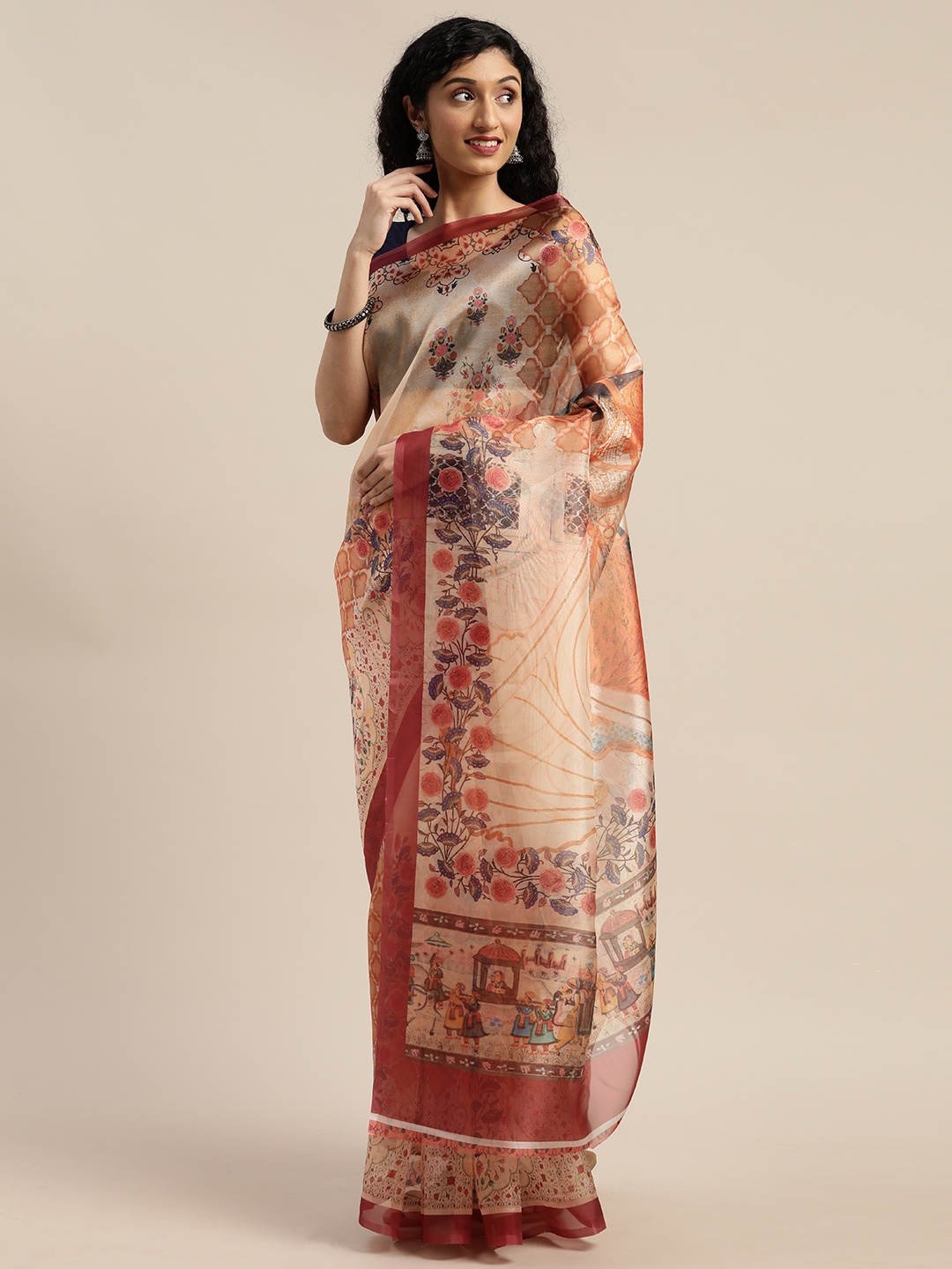 

Rajnandini Orange & Pink Organza Printed Saree