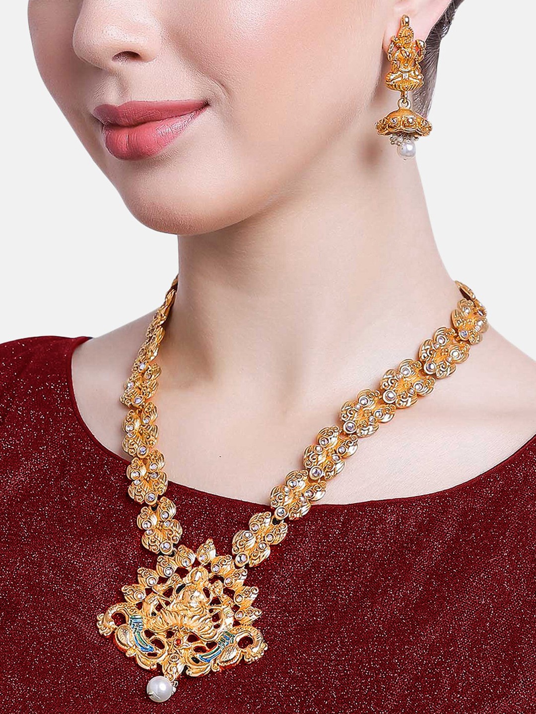 

Estele Gold-Plated White & Blue Stone-Studded Laxmi Ji with Peacock Jewellery Set