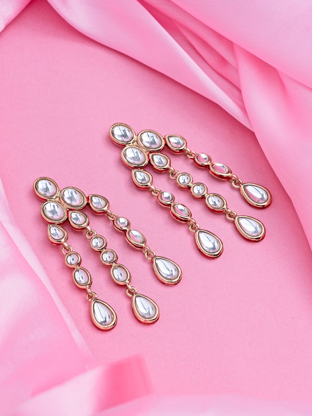 

Estele White & Gold-Toned Teardrop Shaped Kundan Drop Earrings