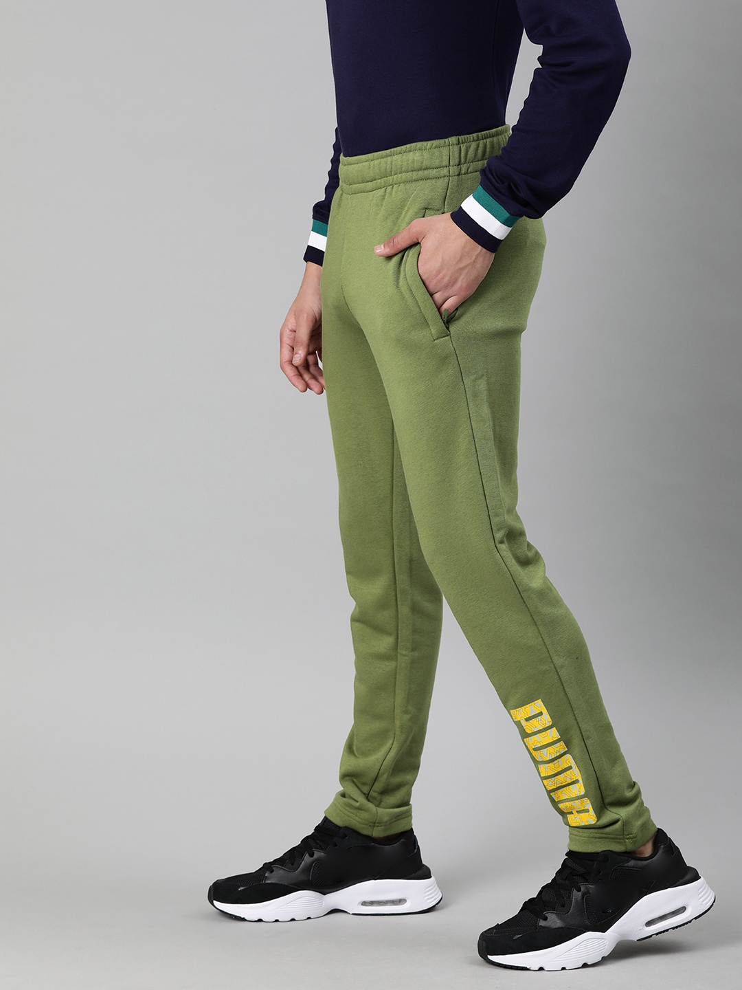 

Puma Men Olive Green & Yellow Printed Track Pants