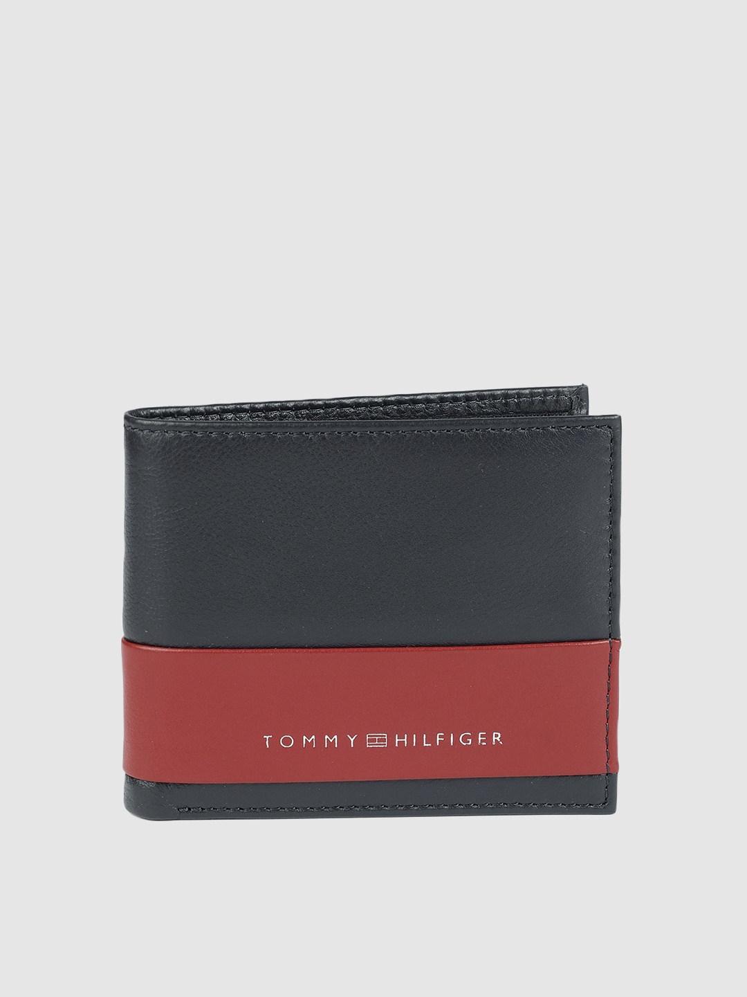 

Tommy Hilfiger Men Navy Blue & Red Colourblocked Leather Two Fold Wallet