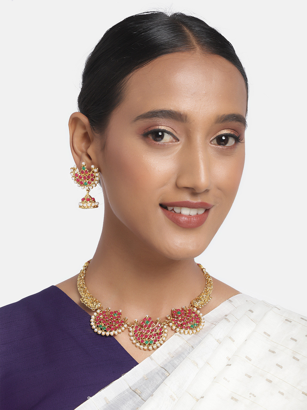 

Zaveri Pearls Gold-Toned & Pink Stone Studded Jewellery Set