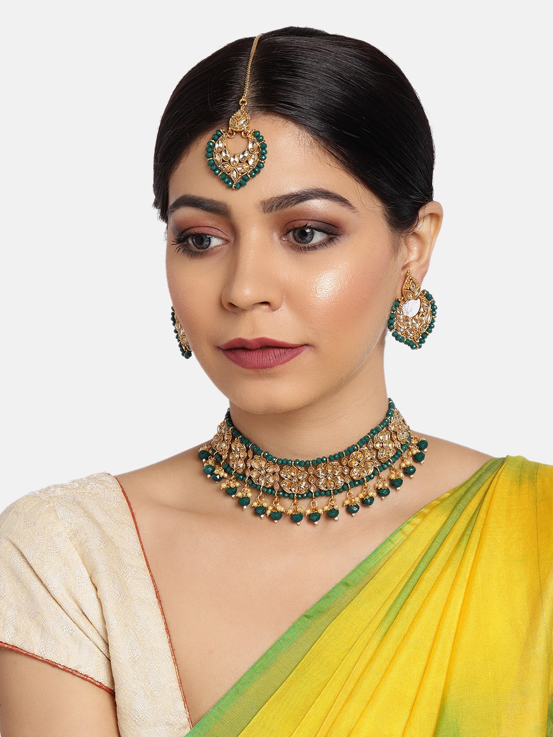 

Zaveri Pearls Green & Gold-Plated Stone Studded Jewellery Set