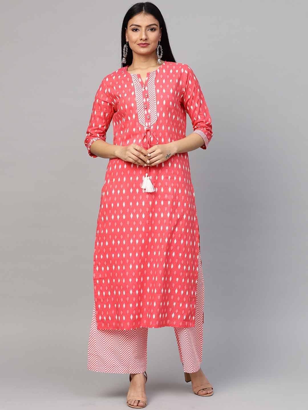 

Sringam Women Coral Pink & White Abstract Print Kurta with Palazzos
