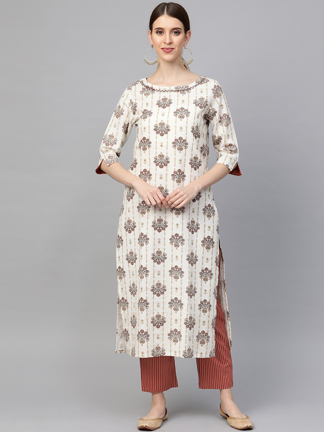 

Sringam Women Off-White & Rust Orange Printed Kurta with Trousers