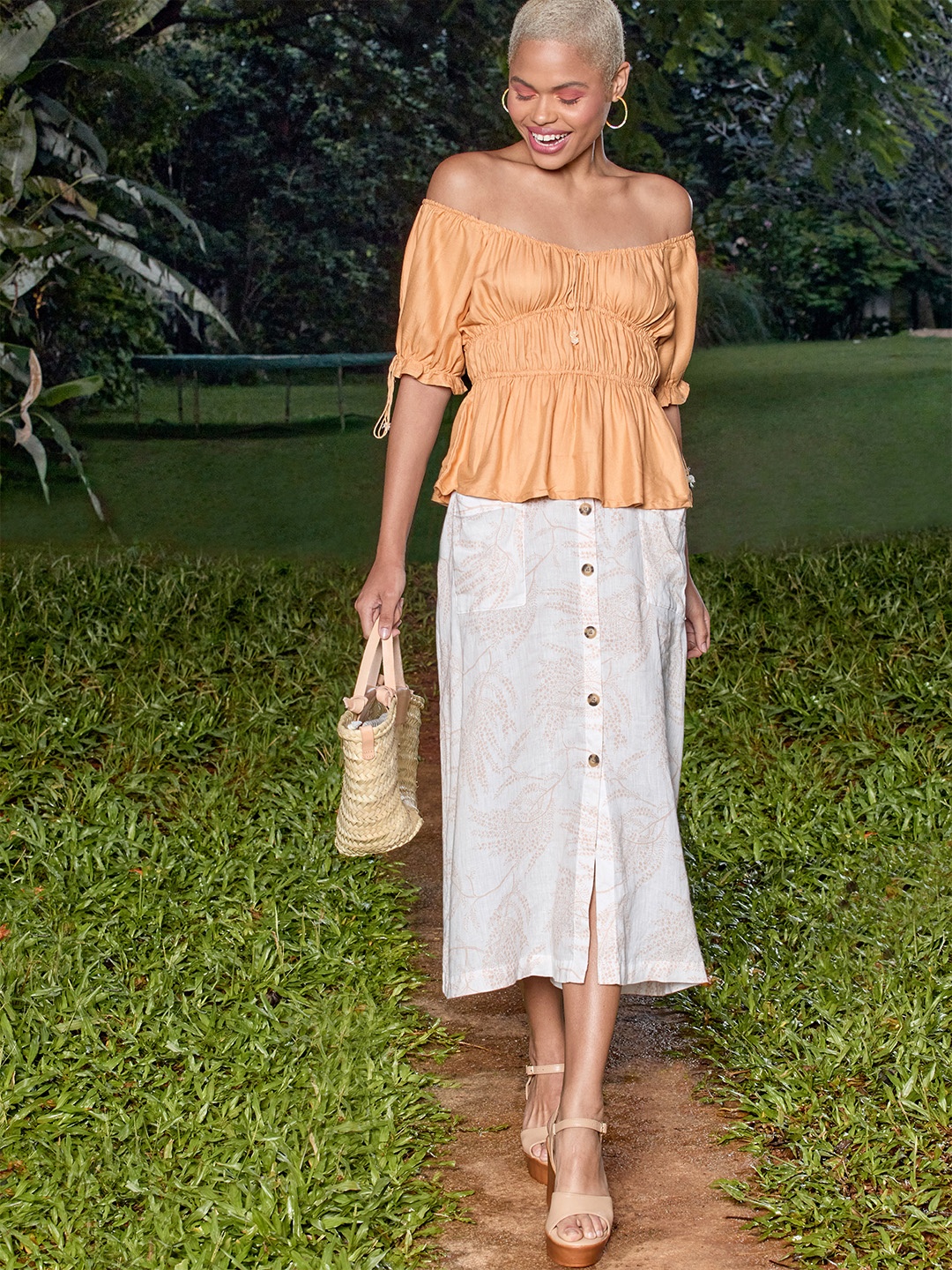 

Tokyo Talkies Women Peach-Coloured Solid Bardot Top