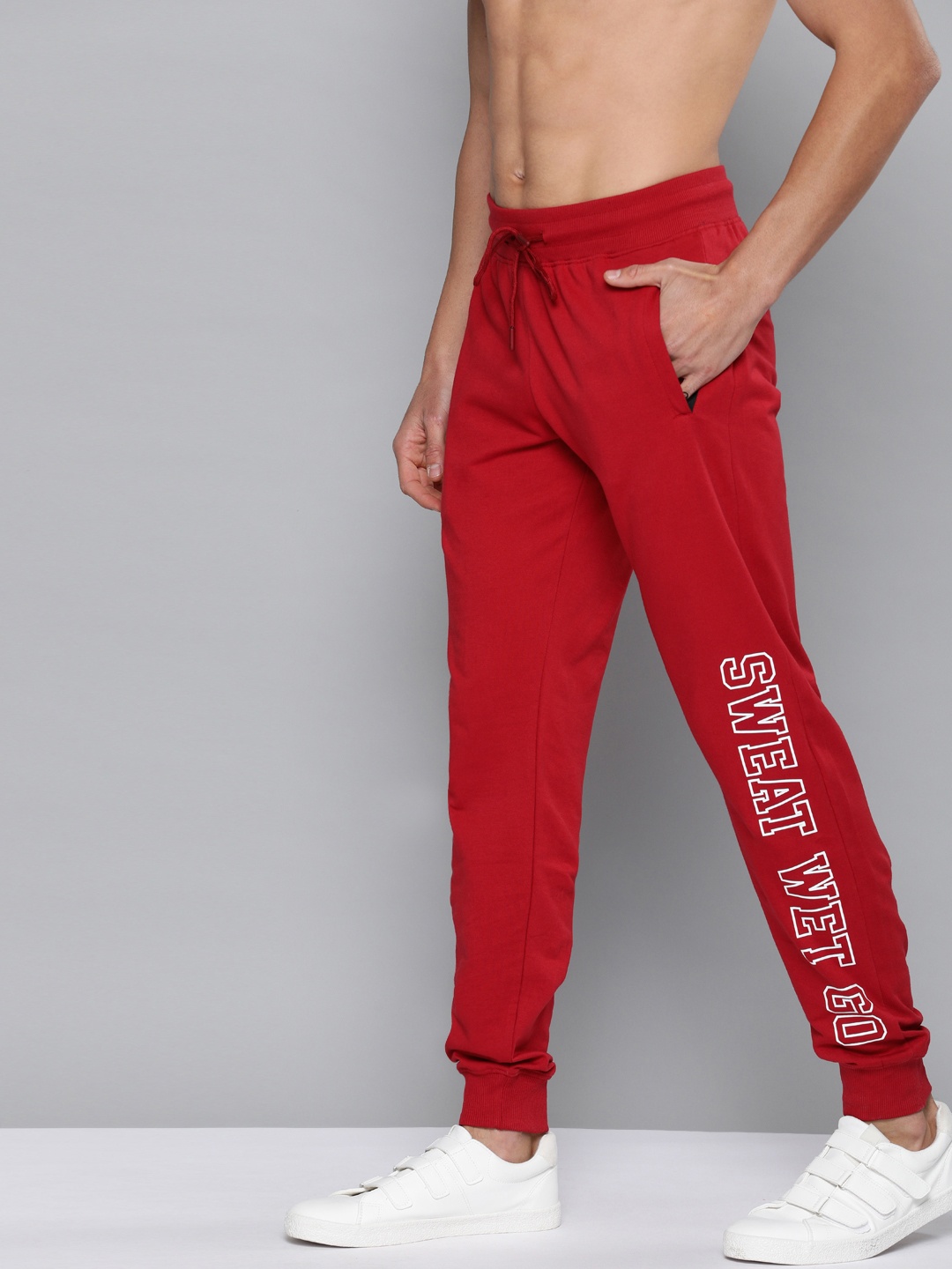

HERE&NOW Men Red Solid Pure Cotton Joggers with Printed Detail