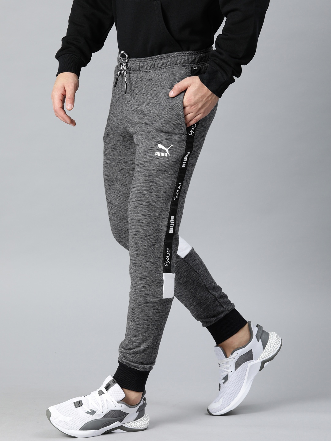 

Puma Men Charcoal Grey Solid Straight Fit VK Joggers with Side Stripes