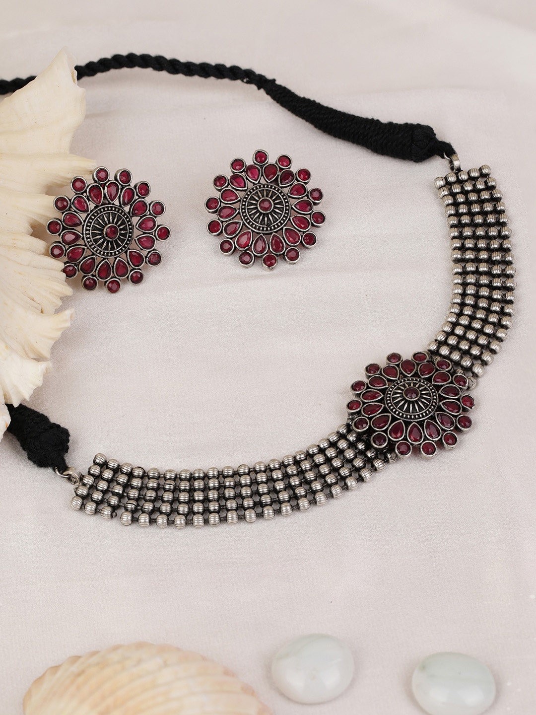

Priyaasi Magenta Oxidised Silver-Plated Ruby-Studded Handcrafted Jewellery Set