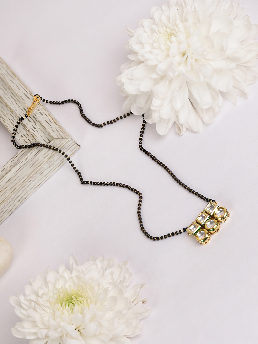 

Priyaasi Black Gold-Plated Kundan-Studded & Beaded Mangalsutra