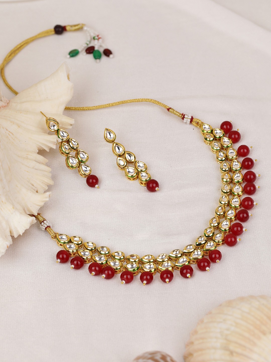 

Priyaasi Red Gold-Plated Kundan Studded & Beaded Handcrafted Jewellery Set