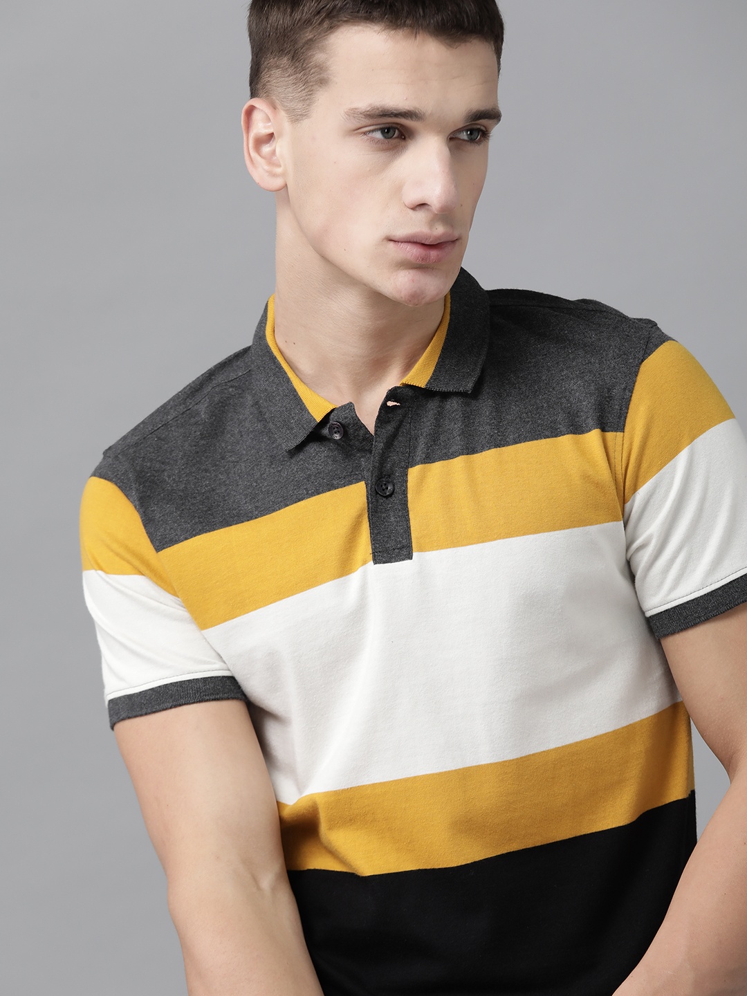 

Roadster Men Charcoal Grey & White Striped Polo Collar T-shirt
