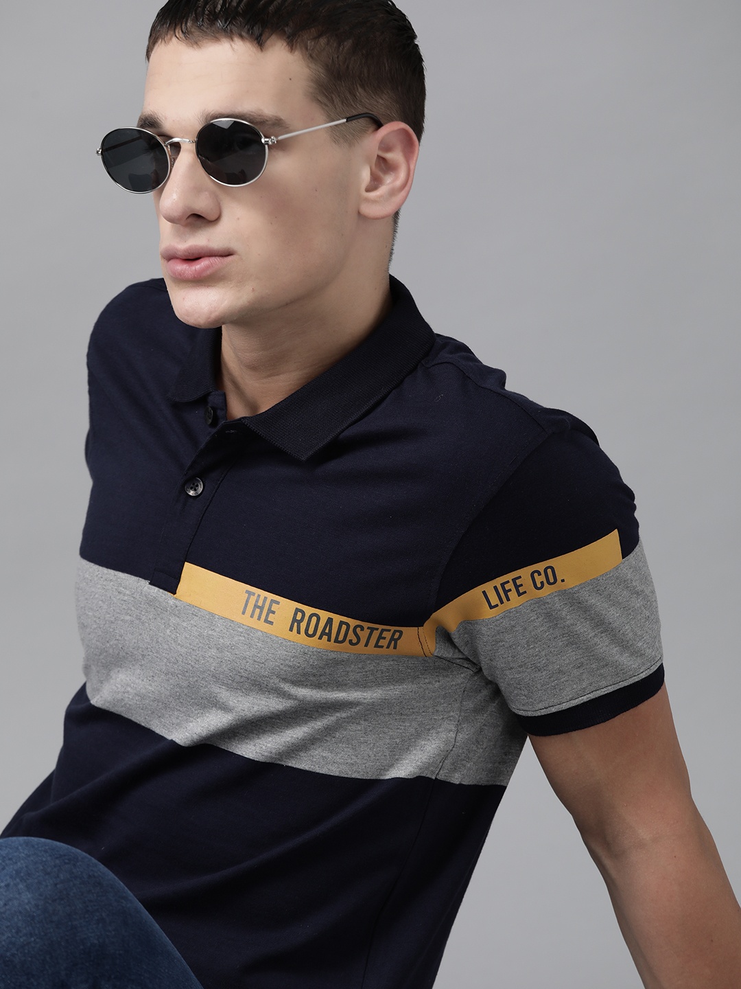 

Roadster Men Navy & Grey Melange Striped Polo Collar T-shirt, Navy blue