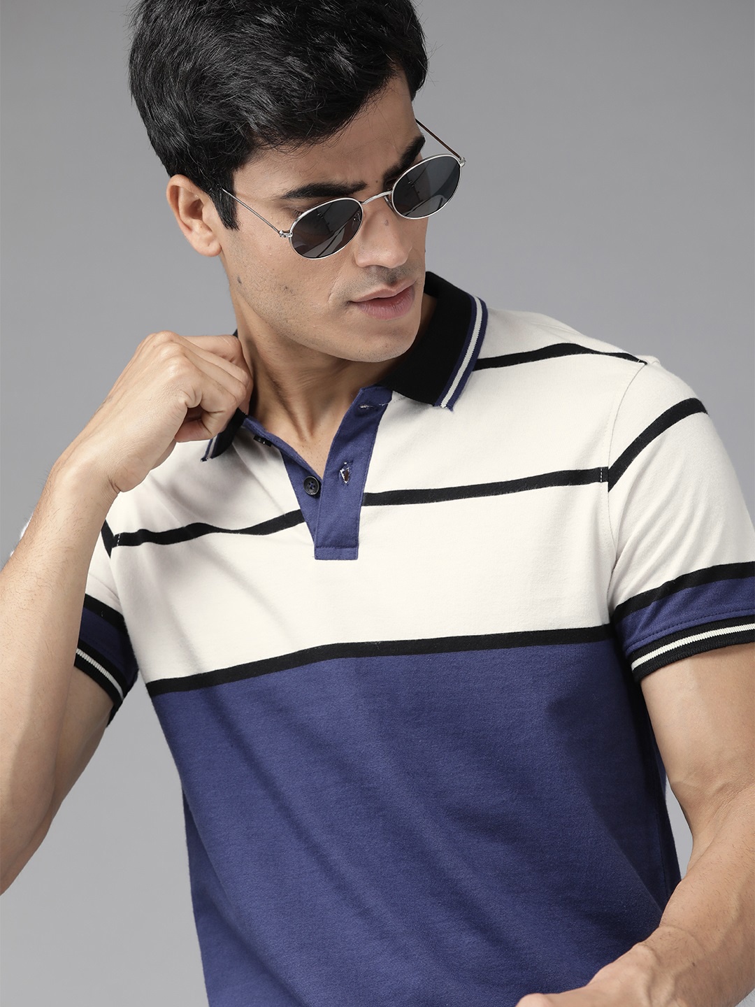 

Roadster Men Blue & Off-White Colourblocked Cotton Polo Collar T-shirt