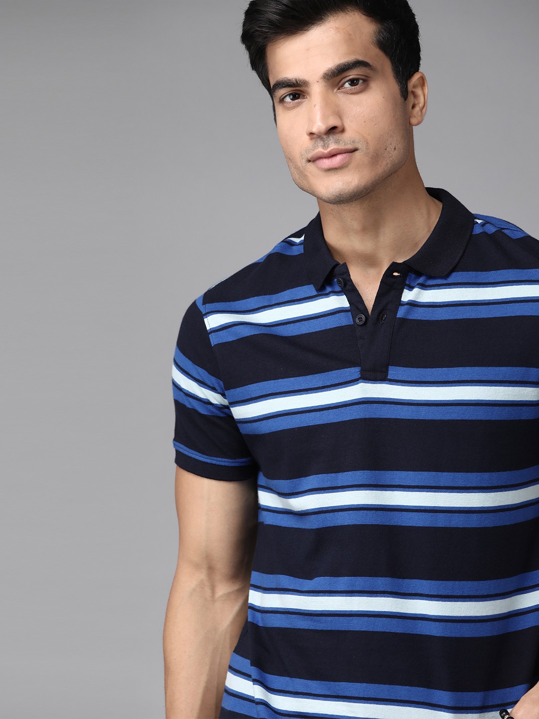 

Roadster Men Blue Pure Cotton Striped Polo Collar Pure Cotton T-shirt