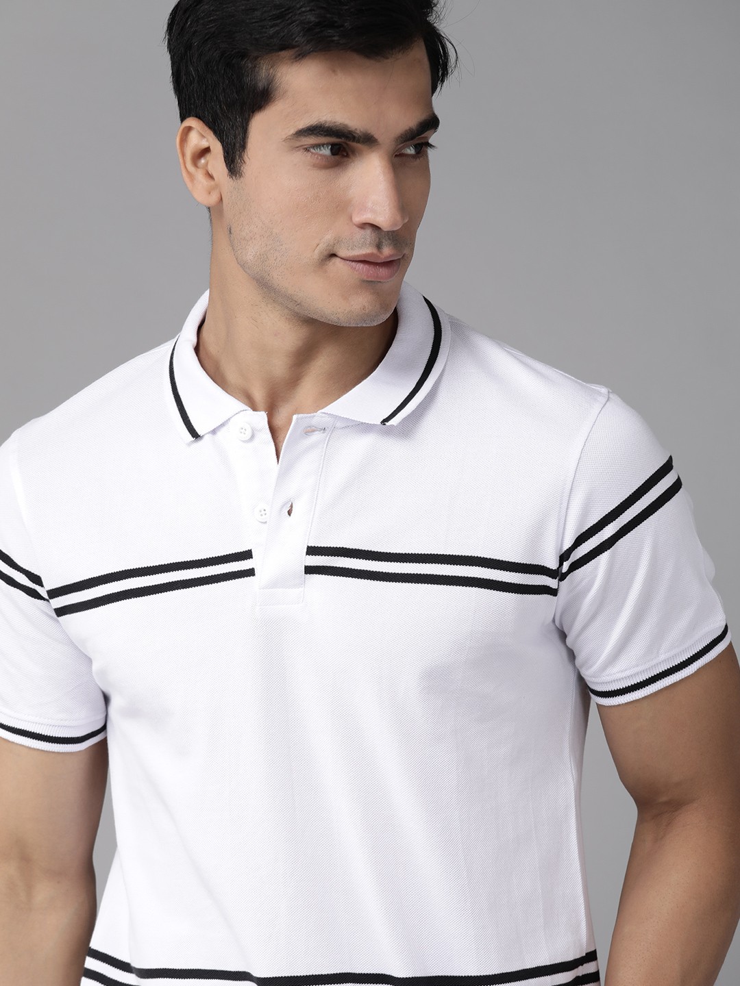 

Roadster Men White & Black Striped Pure Cotton Polo Collar T-shirt