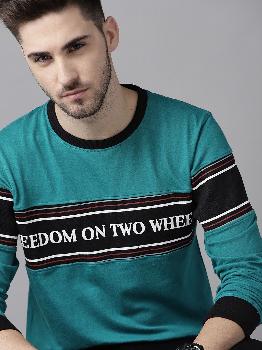 

Roadster Men Teal Blue & Black Typography Printed Pure Cotton T-shirt
