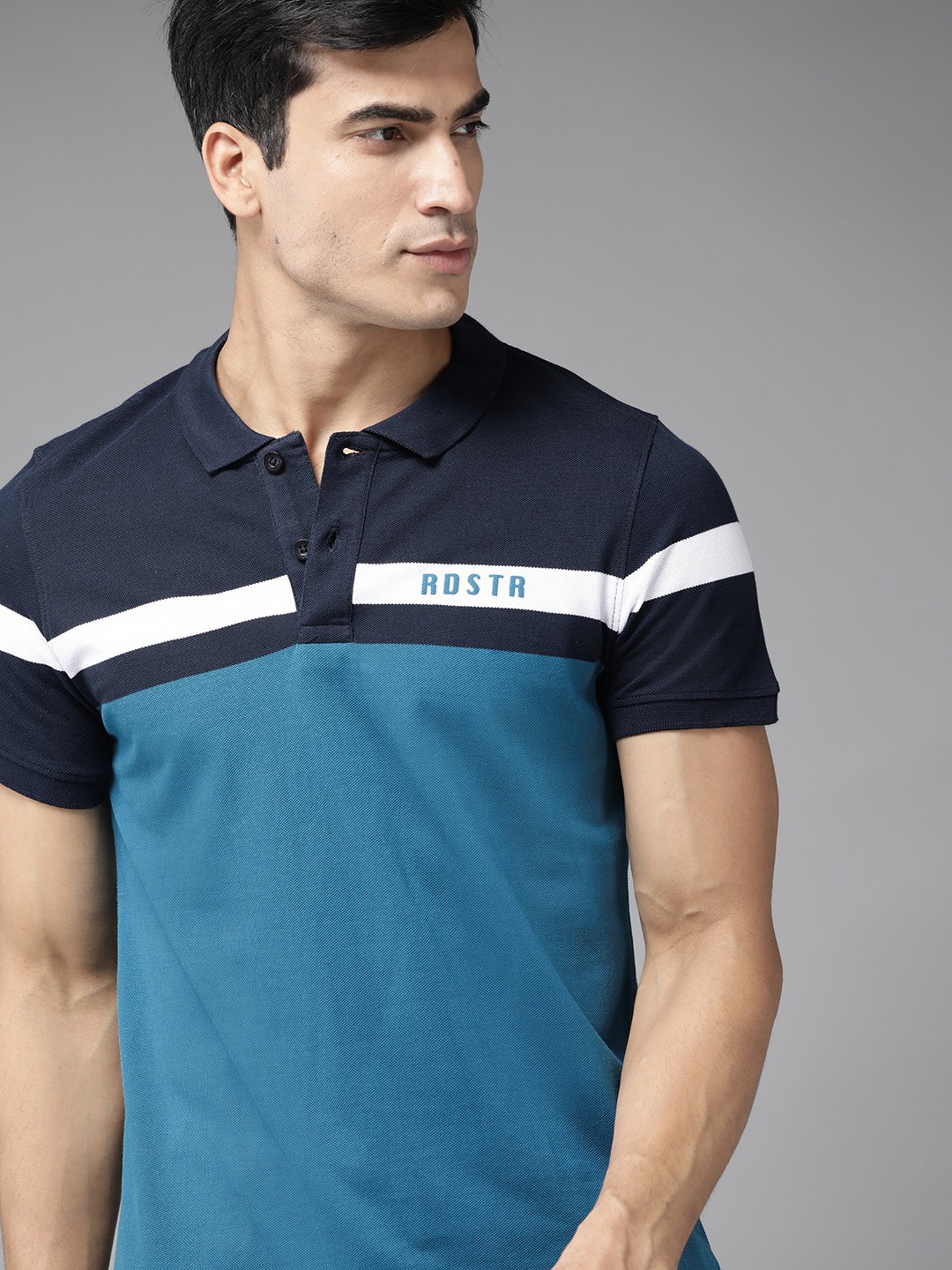 

Roadster Men Blue Pure Cotton Colourblocked Polo Collar T-shirt