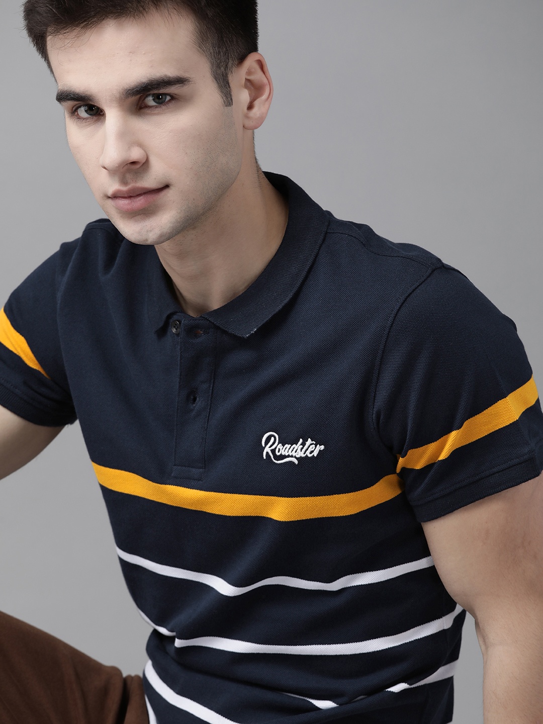 

Roadster Men Navy Blue & White Pure Cotton Striped Polo Collar T-shirt