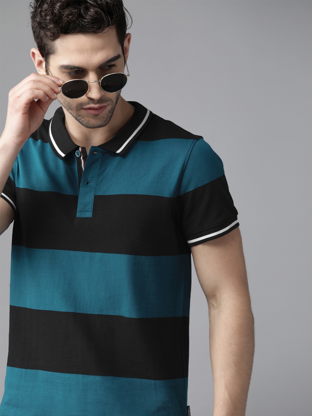 

Roadster Men Teal Blue Black Striped Pure Cotton Polo Collar Pure Cotton T-shirt