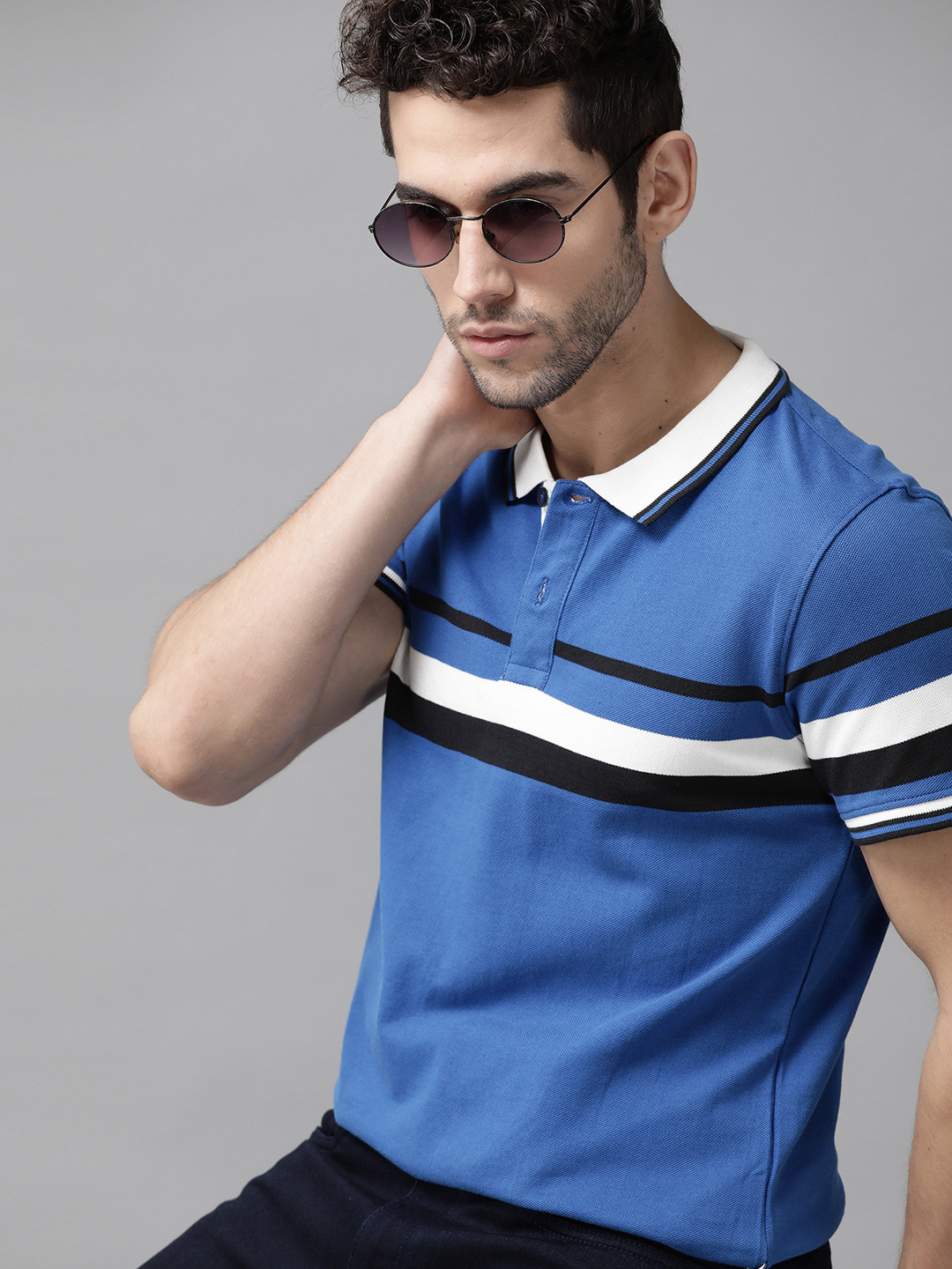 

Roadster Men Blue & White Striped Pure Cotton Polo Collar T-shirt