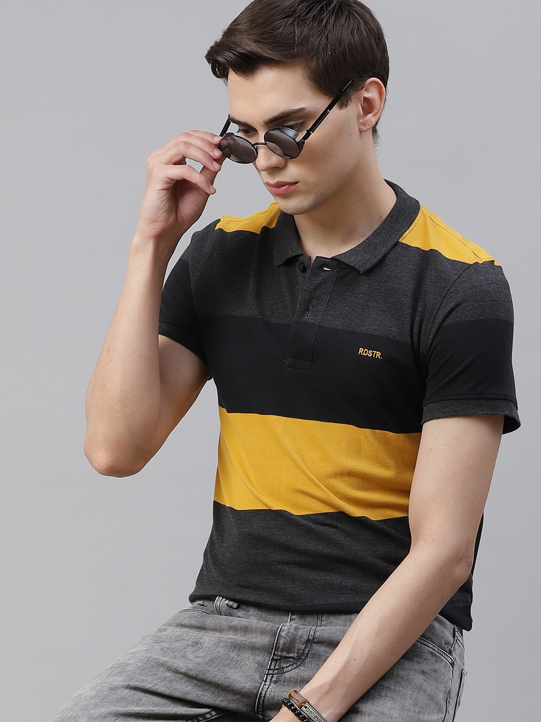 

Roadster Men Black & Mustard Yellow Colourblocked Polo Collar T-shirt