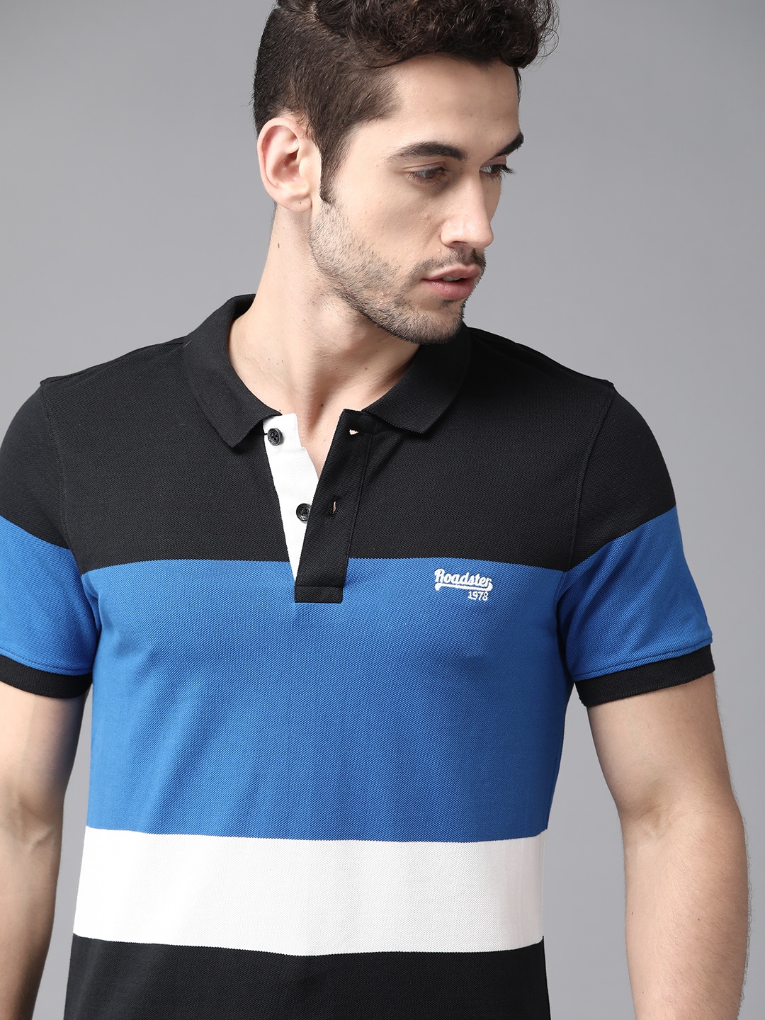 

Roadster Men Blue & Black Pure Cotton Colourblocked Polo Collar T-shirt