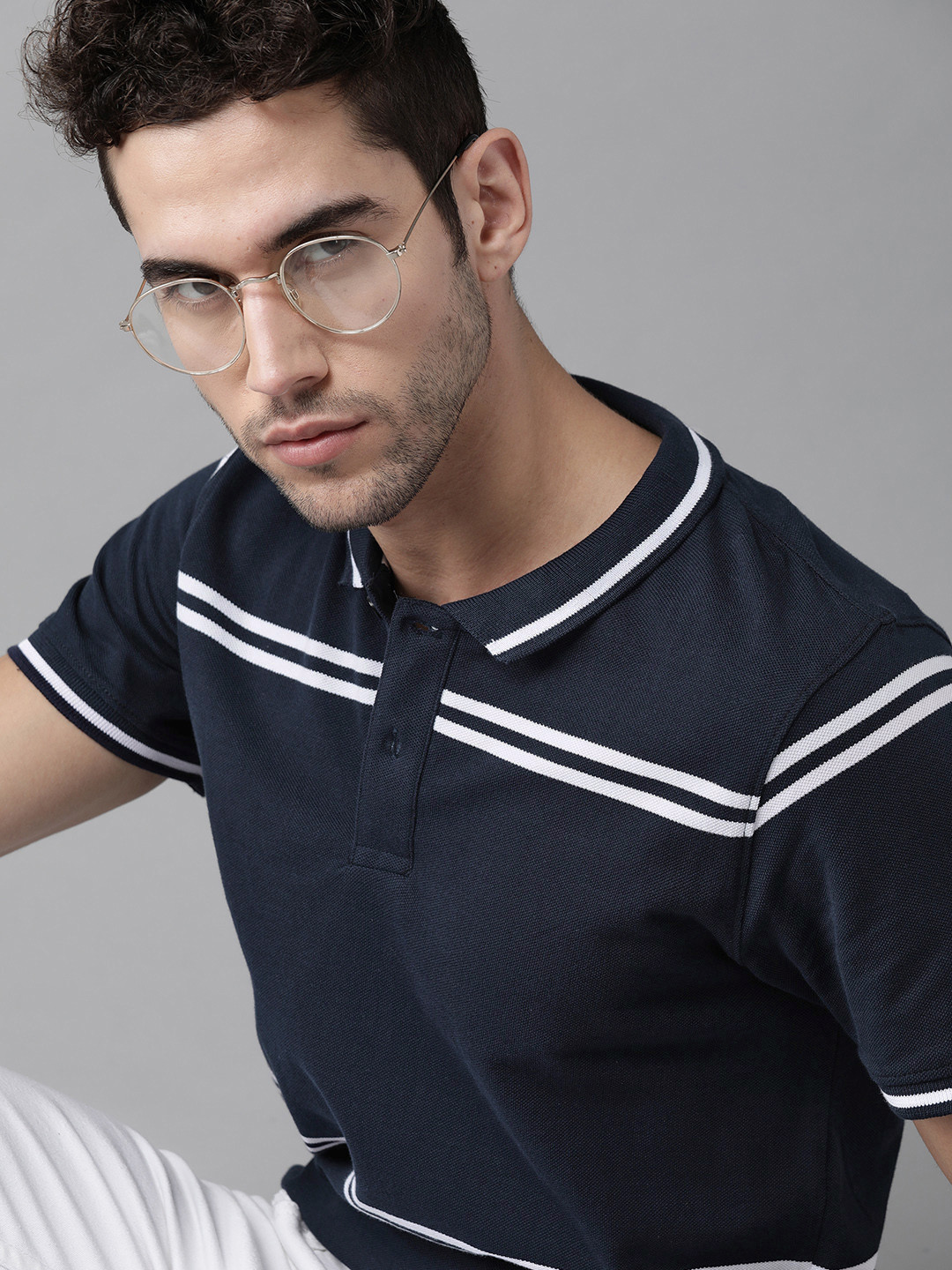 

Roadster Men Navy Blue Striped Pure Cotton Polo Collar T-shirt