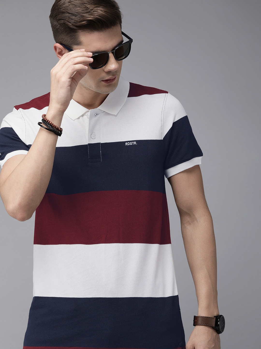

Roadster Men White Navy Blue Striped Polo Collar Pure Cotton T-shirt