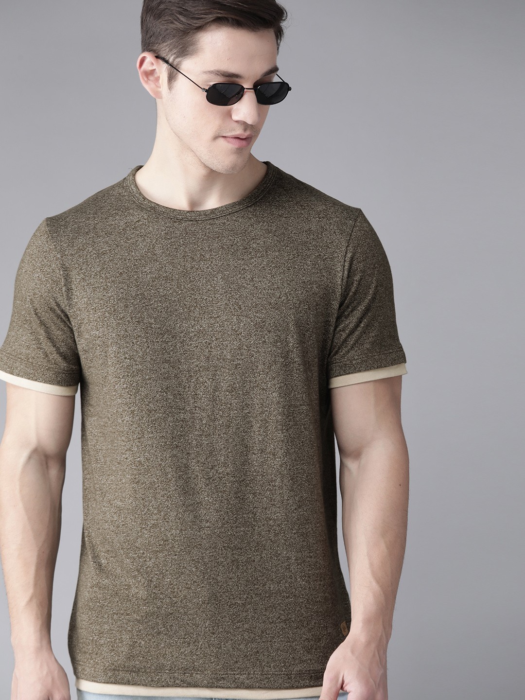 

Roadster Men Olive Green Self Design Round Neck T-shirt