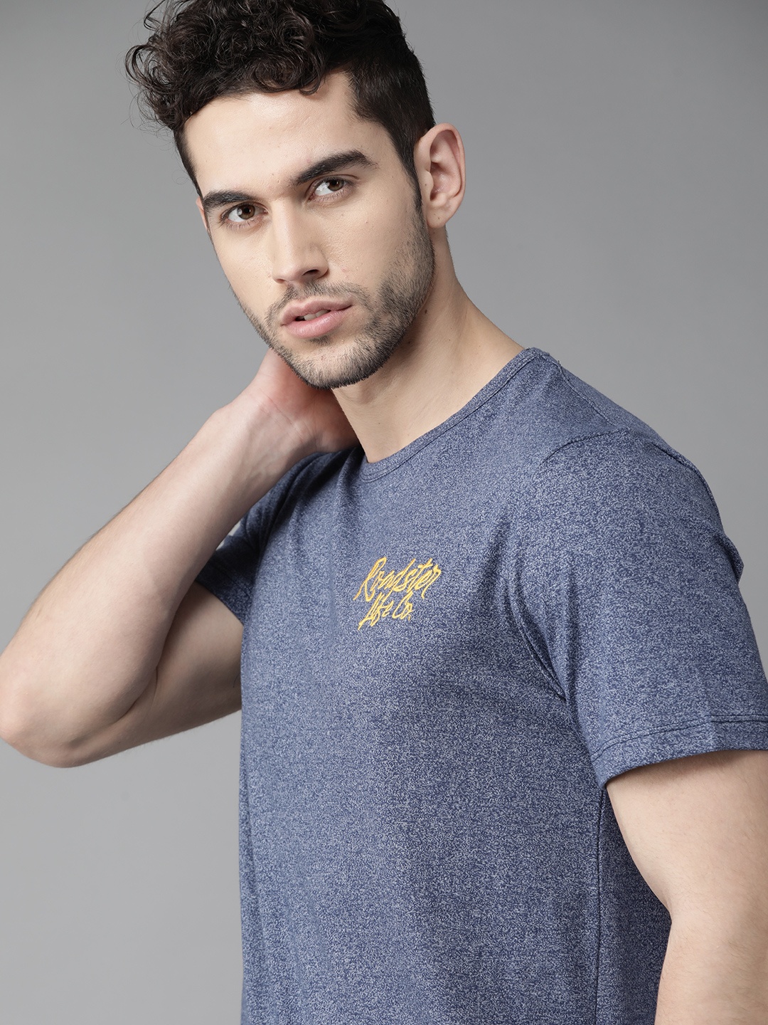 

Roadster Men Blue Self Design Round Neck T-shirt