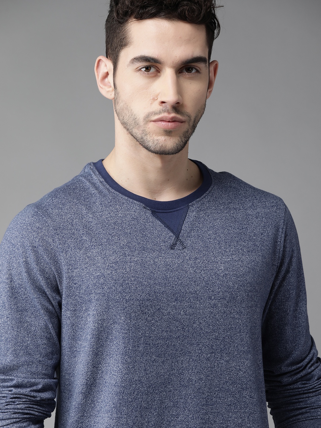 

Roadster Men Blue Self Design Round Neck T-shirt