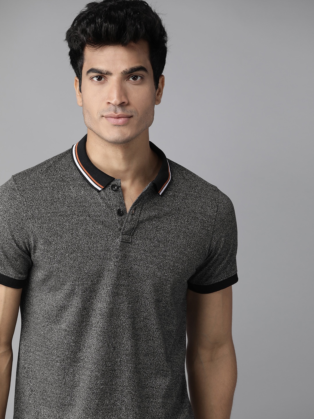 

Roadster Men Charcoal Self Design Polo Collar T-shirt