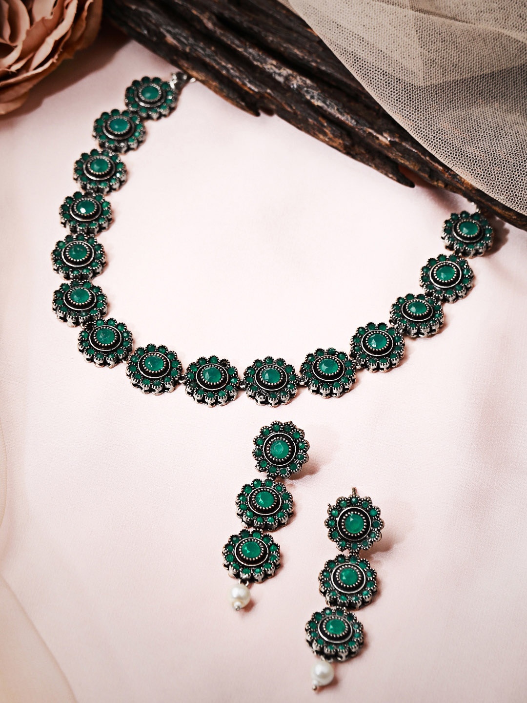 

Rubans Women Silver-Plated Green Stone-Studded Floral Shaped Oxidised Jewellery Set