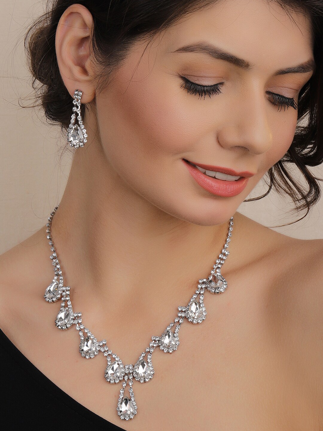 

Rubans Women Silver-Plated White Rhinestone-Studded Tear Drop-Shaped Jewellery Set