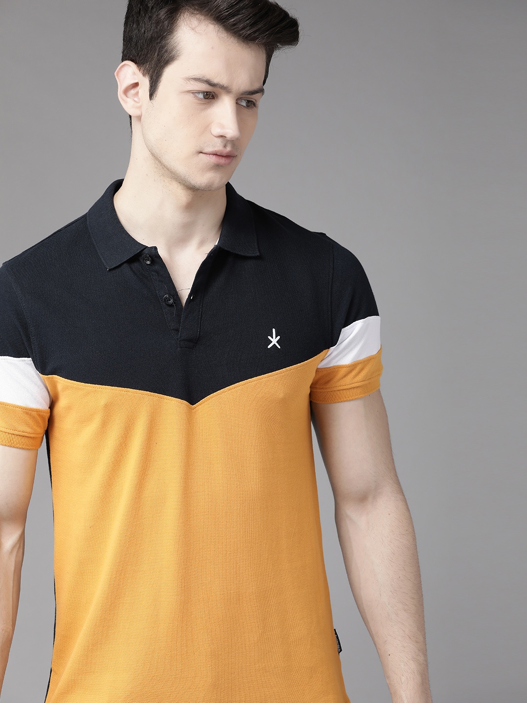 

Roadster Men Mustard Yellow & Navy Blue Pure Cotton Colourblocked Polo Collar T-shirt