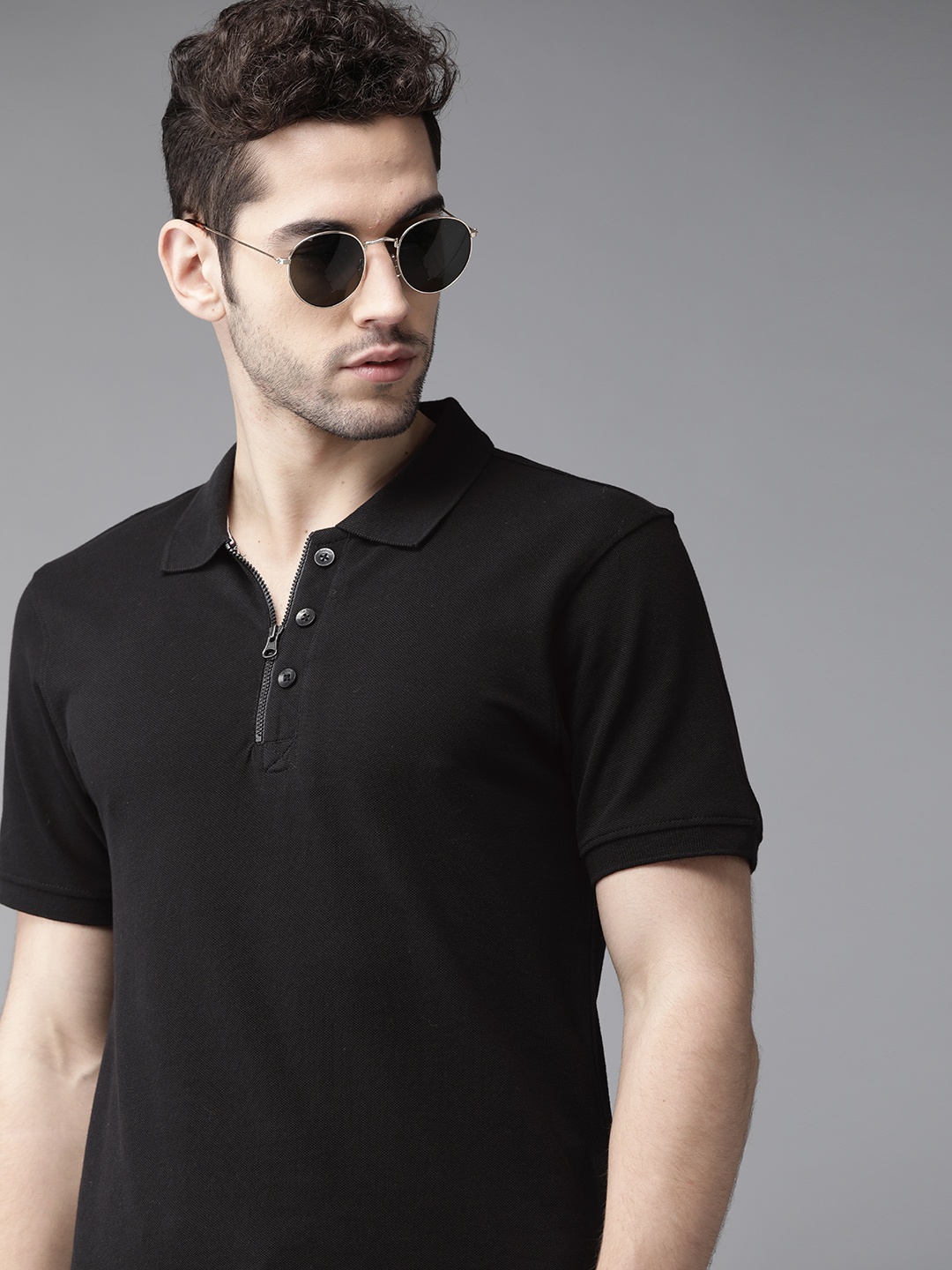 

Roadster Men Black Pure Cotton Solid Polo Collar Pure Cotton T-shirt