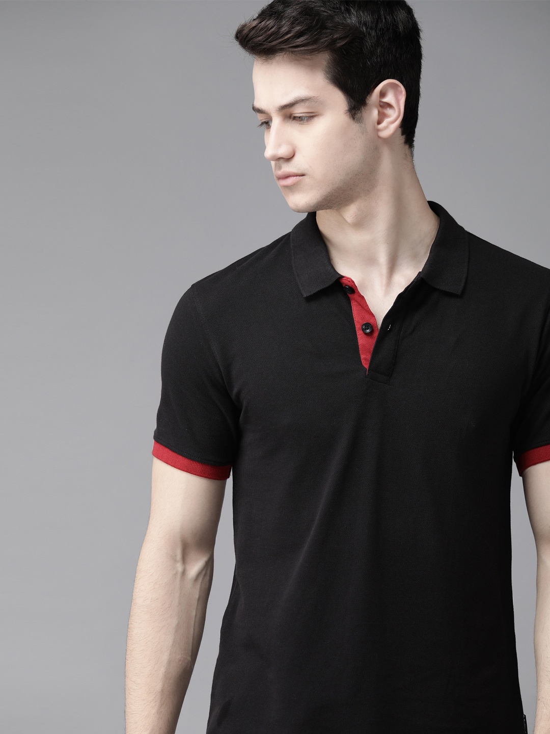 

Roadster Men Black Solid Pure Cotton Polo Collar Pure Cotton T-shirt