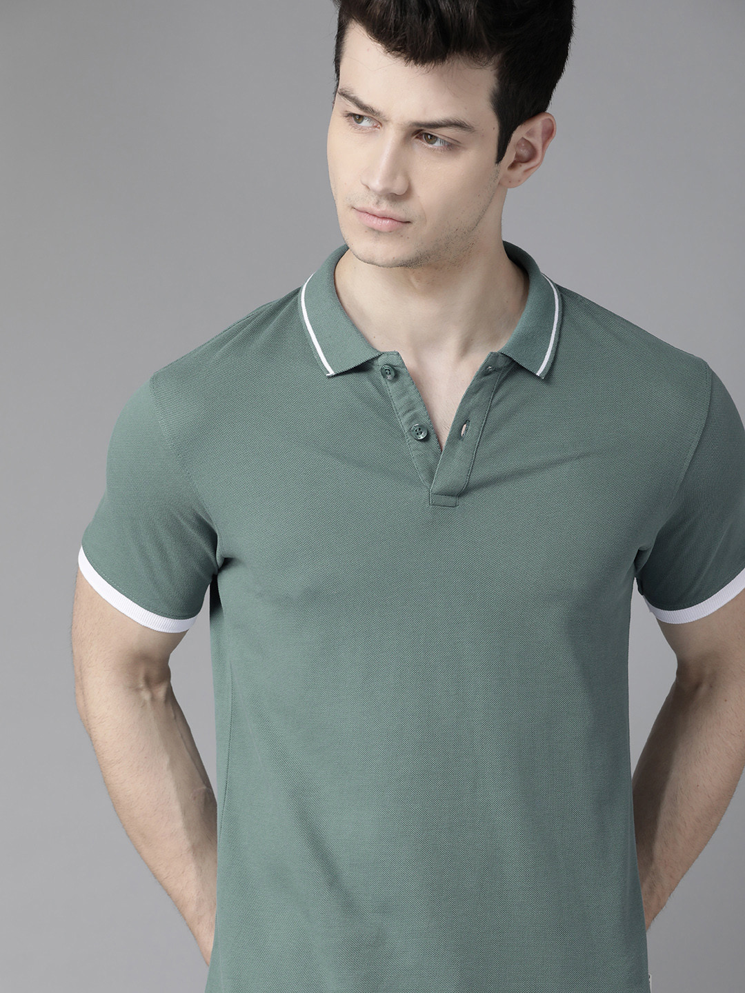 

Roadster Men Green Solid Pure Cotton Polo Collar Pure Cotton T-shirt