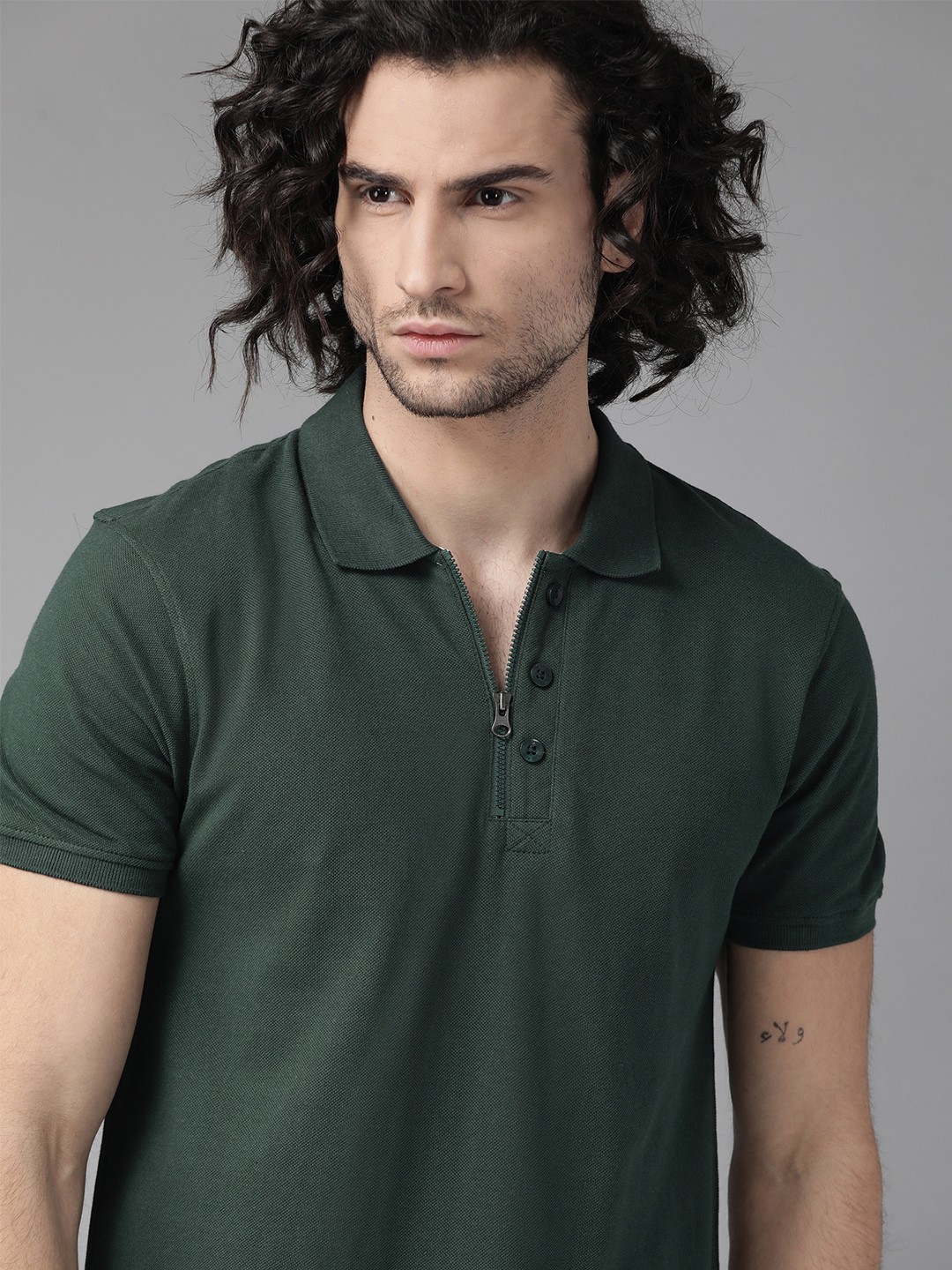 

Roadster Men Green Solid Pure Cotton Polo Collar Pure Cotton T-shirt
