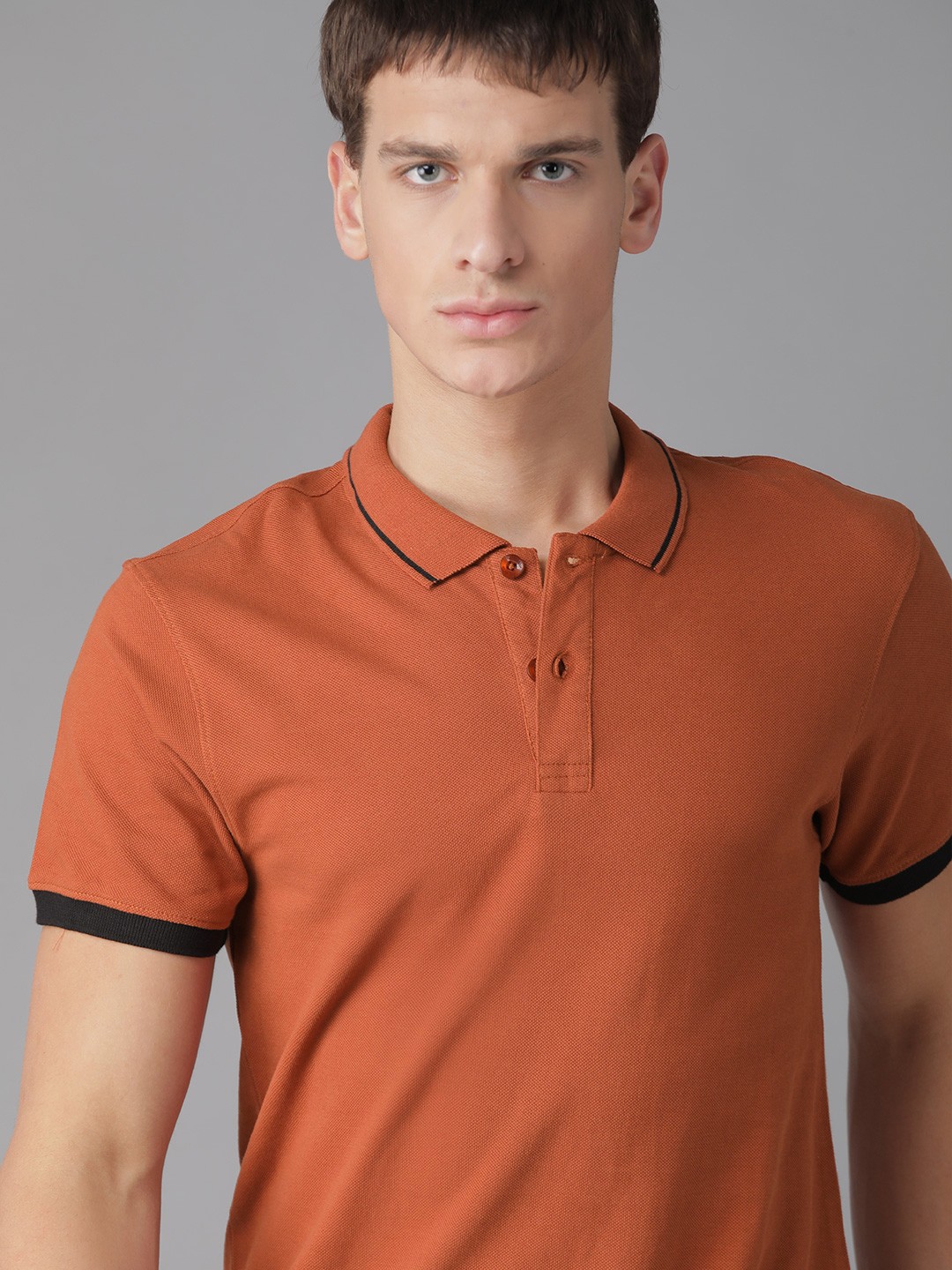 

Roadster Men Rust Orange Pure Cotton Solid Polo Collar T-shirt