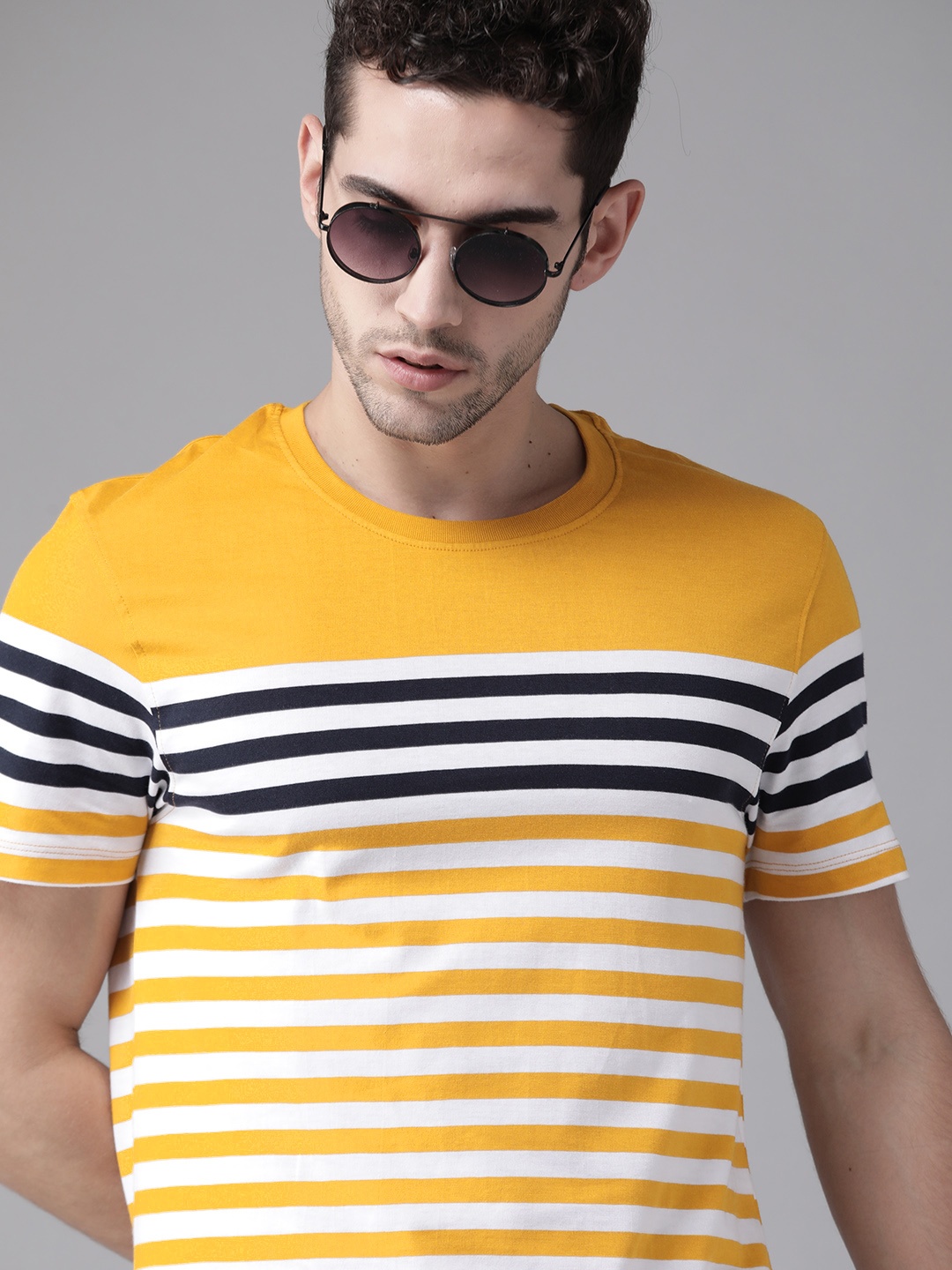 

Roadster Men Mustard Yellow & White Striped Round Neck T-shirt