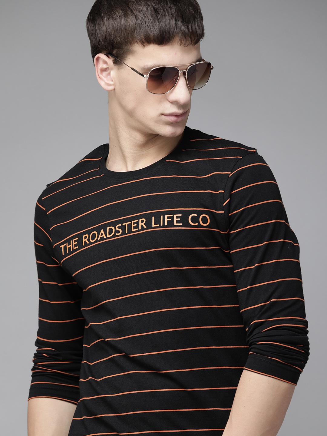 

Roadster Men Black & Orange Pure Cotton Striped Round Neck T-shirt
