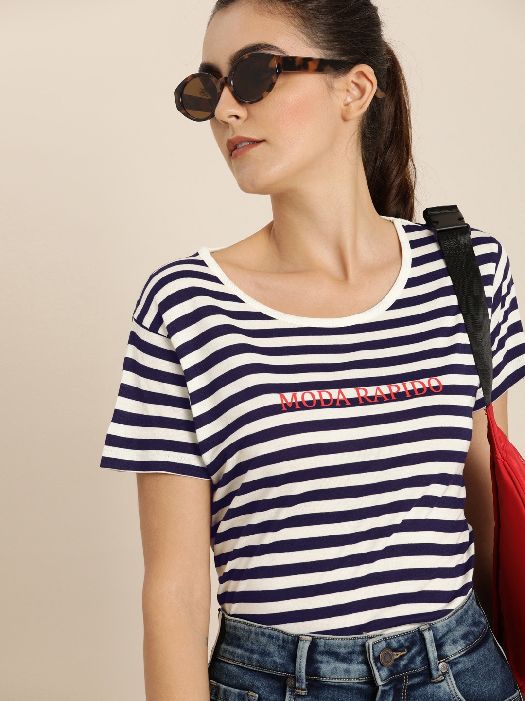 

Moda Rapido Women Navy Blue & Off-White Striped Round Neck T-shirt