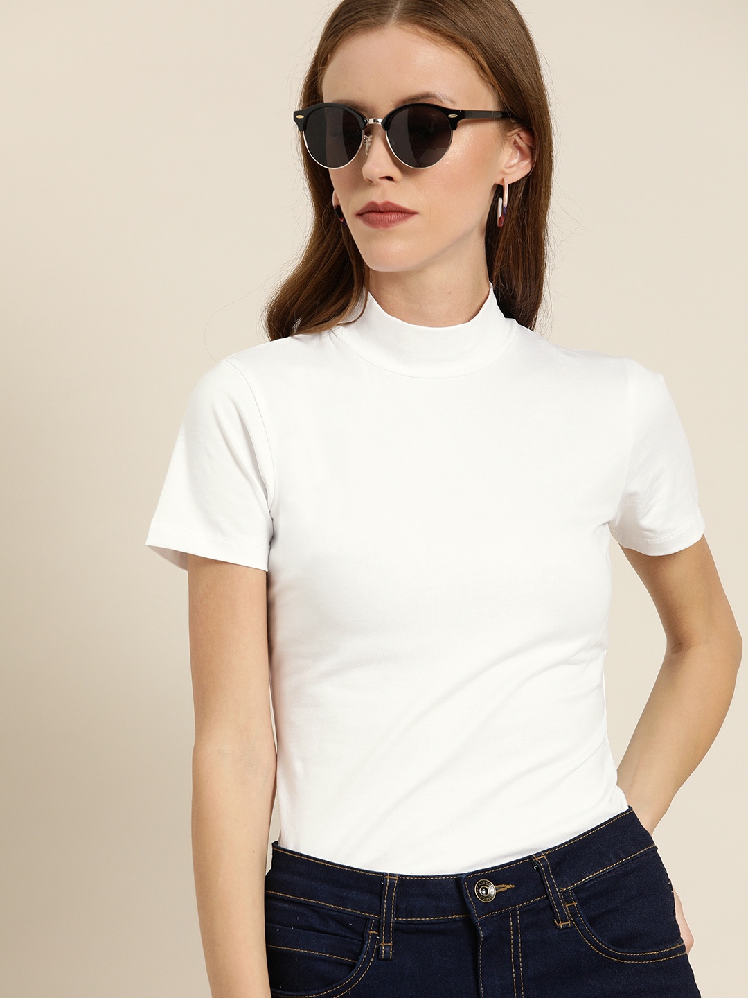 

Moda Rapido Women White Solid High Neck T-shirt